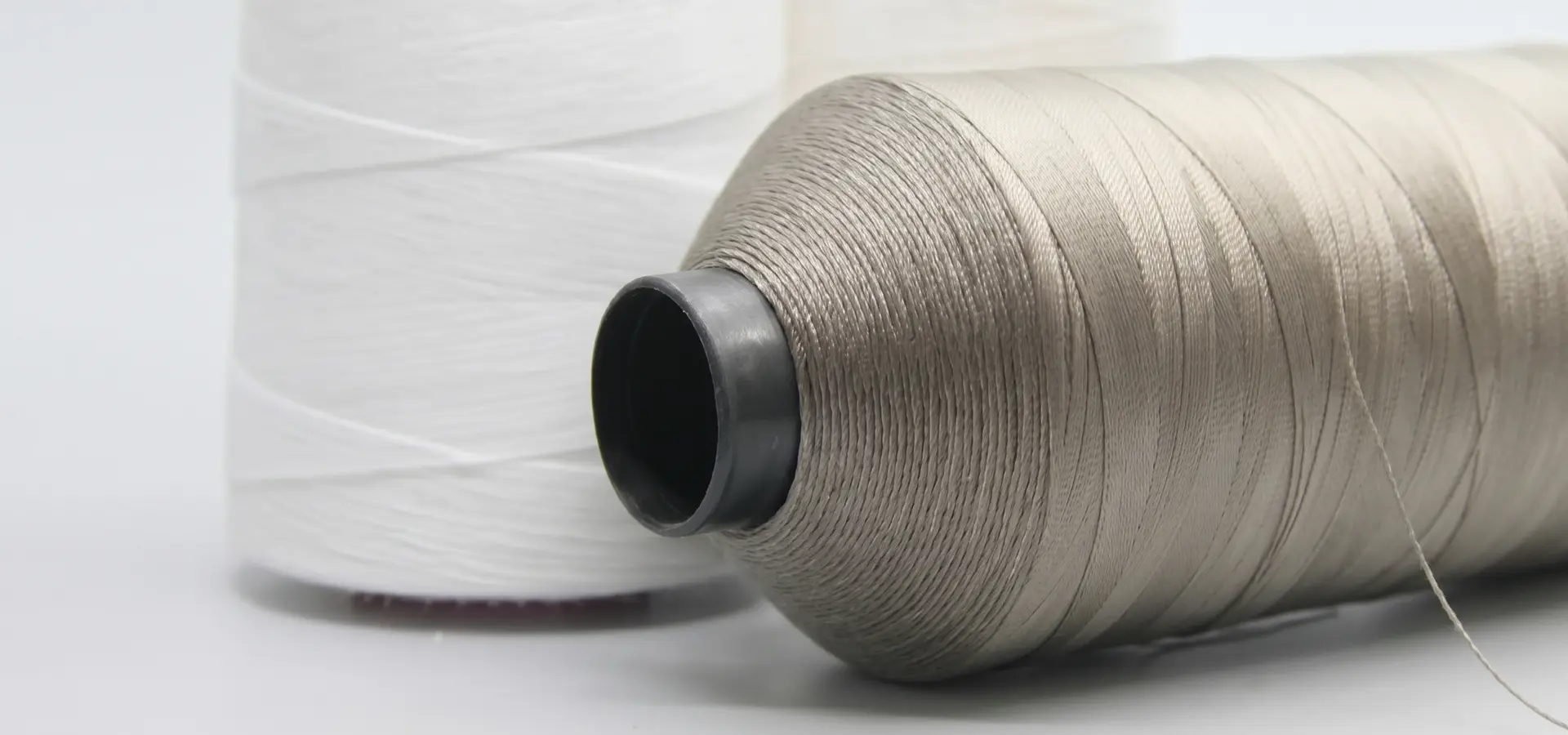 Fábrica de hilo de coser de filamento de poliéster Fábrica de hilo de coser de filamento de poliéster